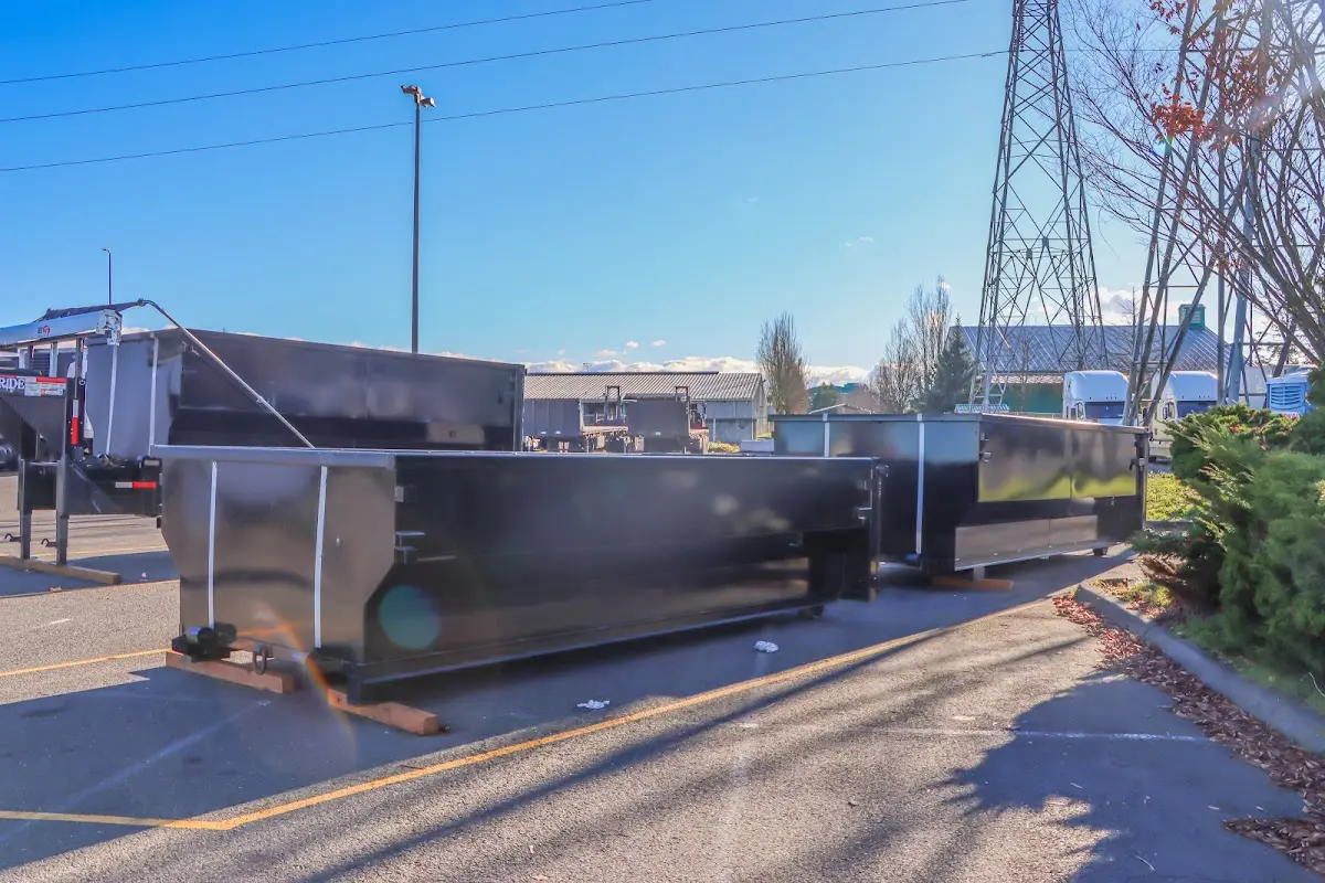 Roll-off dumpster ready for waste disposal at job site for 20 Yard Dumpster Rental in Colchester